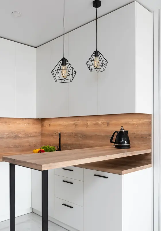 Ken Caryl · walnut and brass